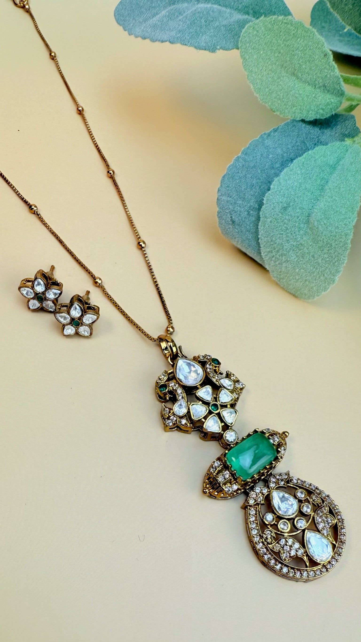 Premium polki doublet stone pendant set with earrings