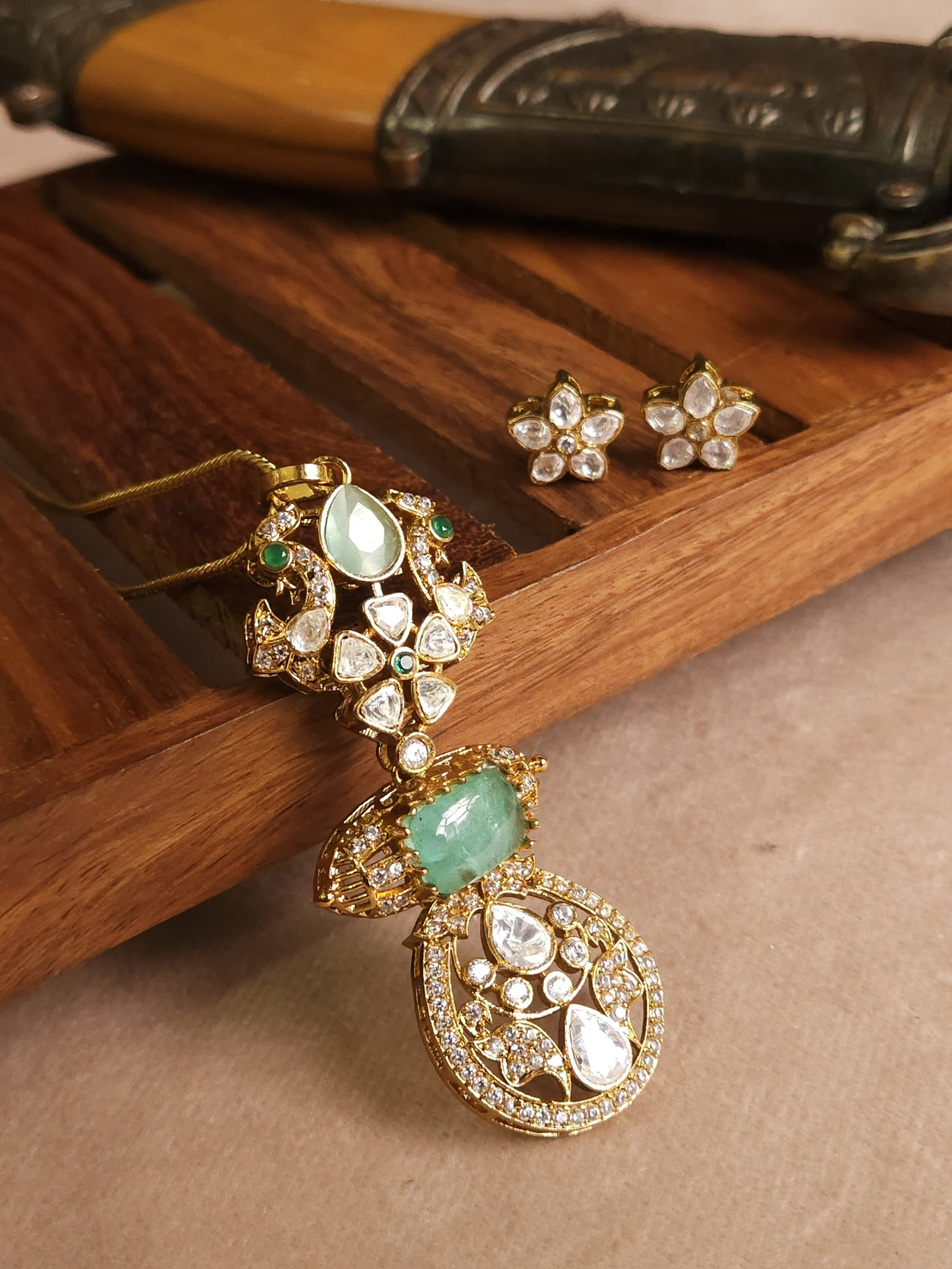Premium polki doublet stone pendant set with earrings